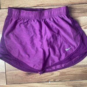 Purple Nike shorts